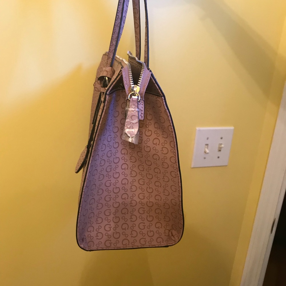Guess satchel never been use